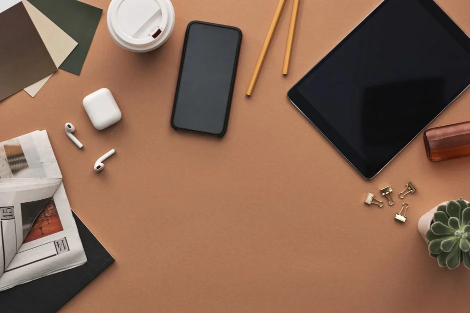 A modern workspace featuring a laptop, tablet, and smartphones, well suited to tech projects and freelance work.
